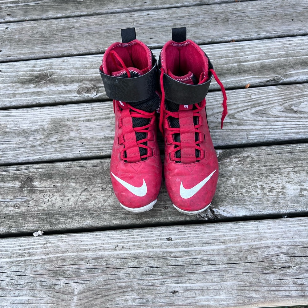 Size 9 Nike, red football cleats, high ankle support